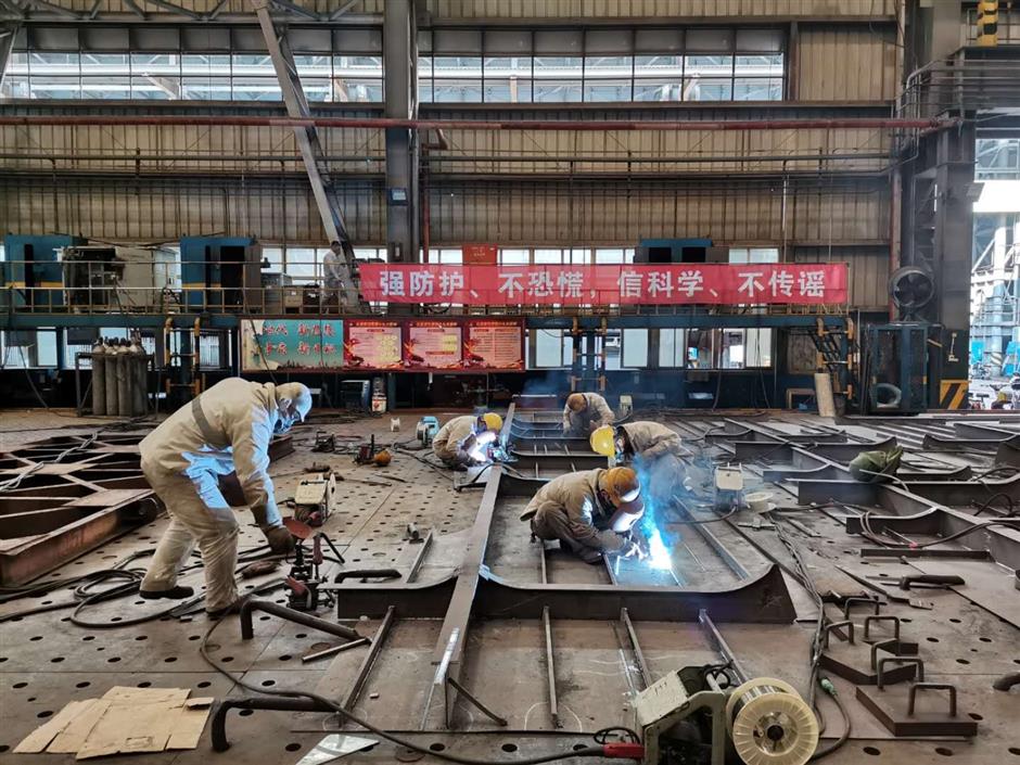 Pudong firms returning to normal working