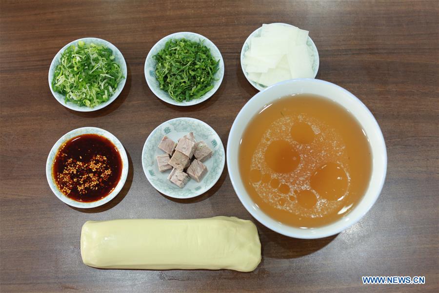 Lanzhou beef noodles wins fame both at home and abroad